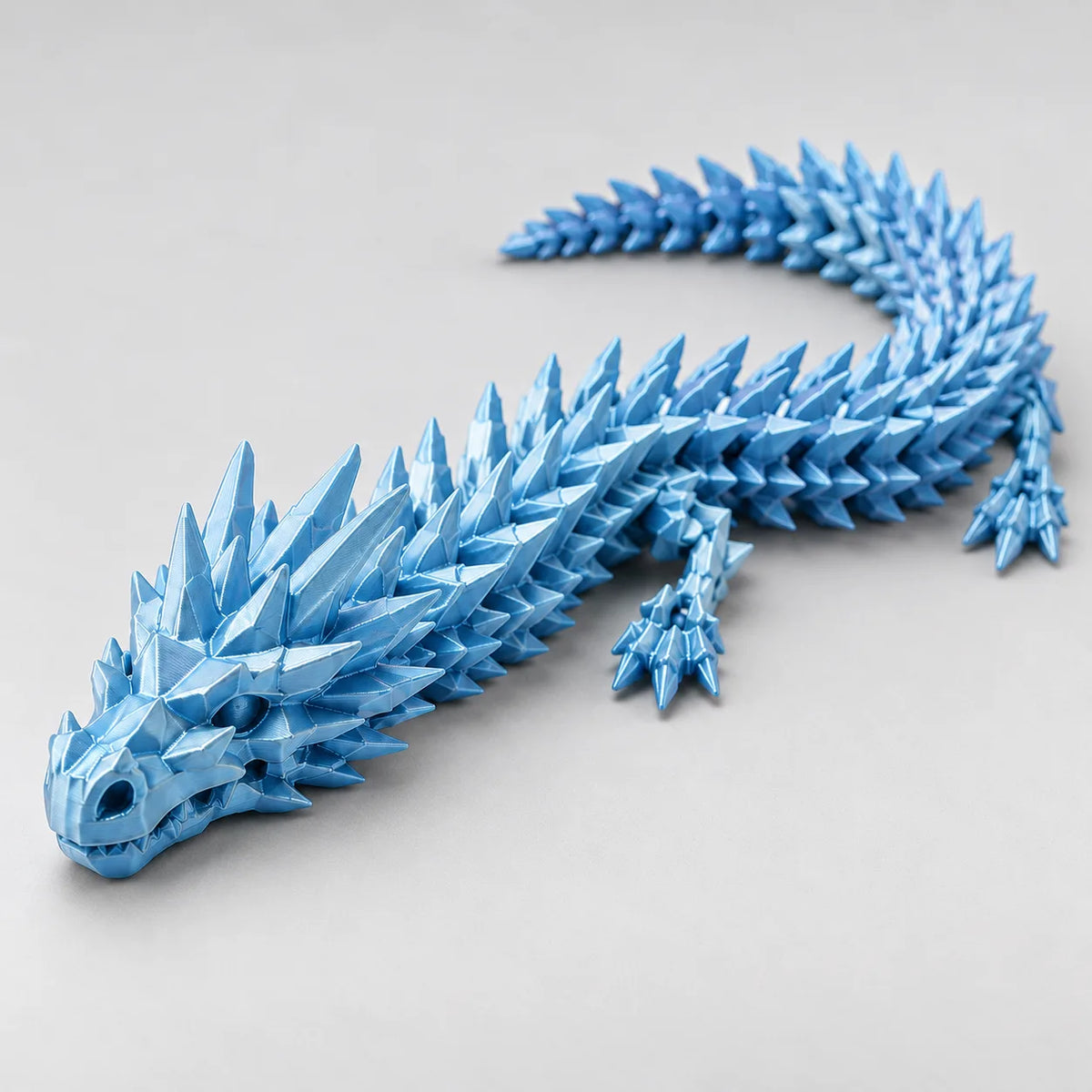Dragão Sensorial Articulado 40 cm - Calma 3D — Toque, Movimento e Diversão
